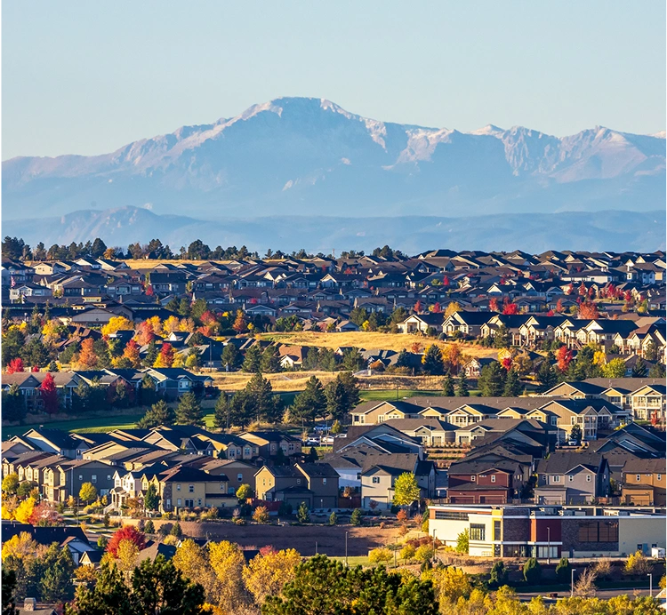 Suburban neighborhood with mountain backdrop