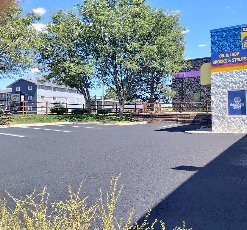 Blue and yellow auto shop exterior