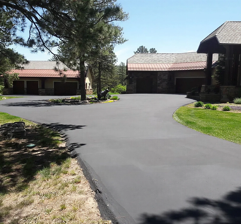 Modern house and paved driveway